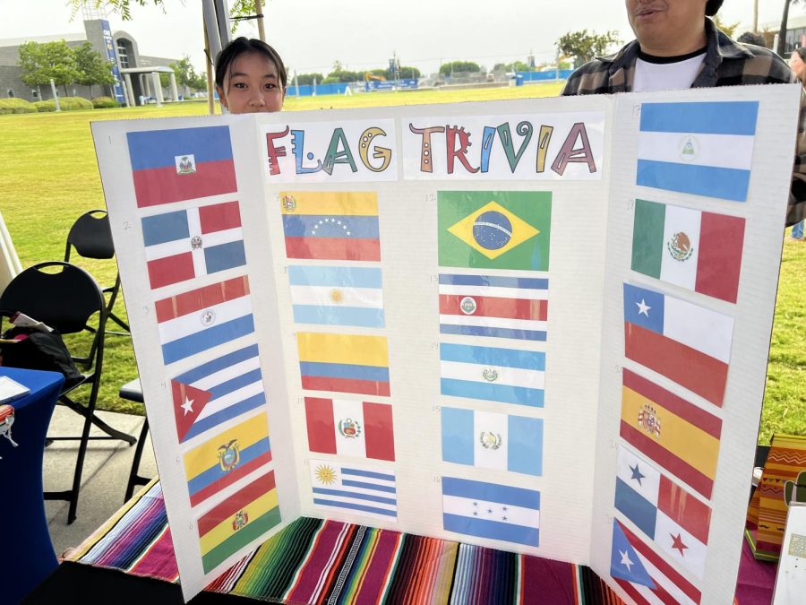 A booth hosted a Latin American flag guessing game. 