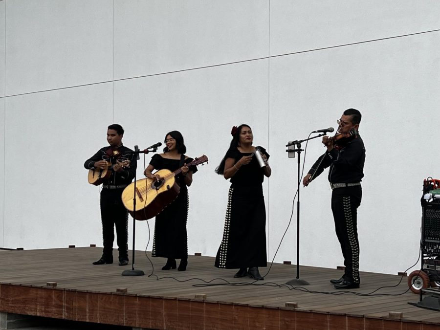 The mariachi band performs for guests of the fair. 