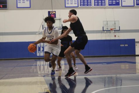 Justin Stephens, whos a Sophomore Forward for the Falcons, drove in the paint and scored a two-pointer during the 81-71 victory against Santa Monica.