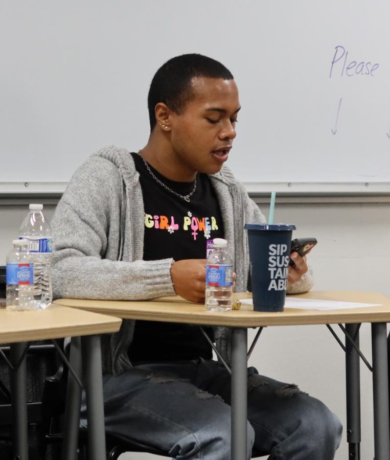 Cerritos student named Bryan Barnes, business administration major, reads a song by Niki Minaj Im The Best on Mar. 8.