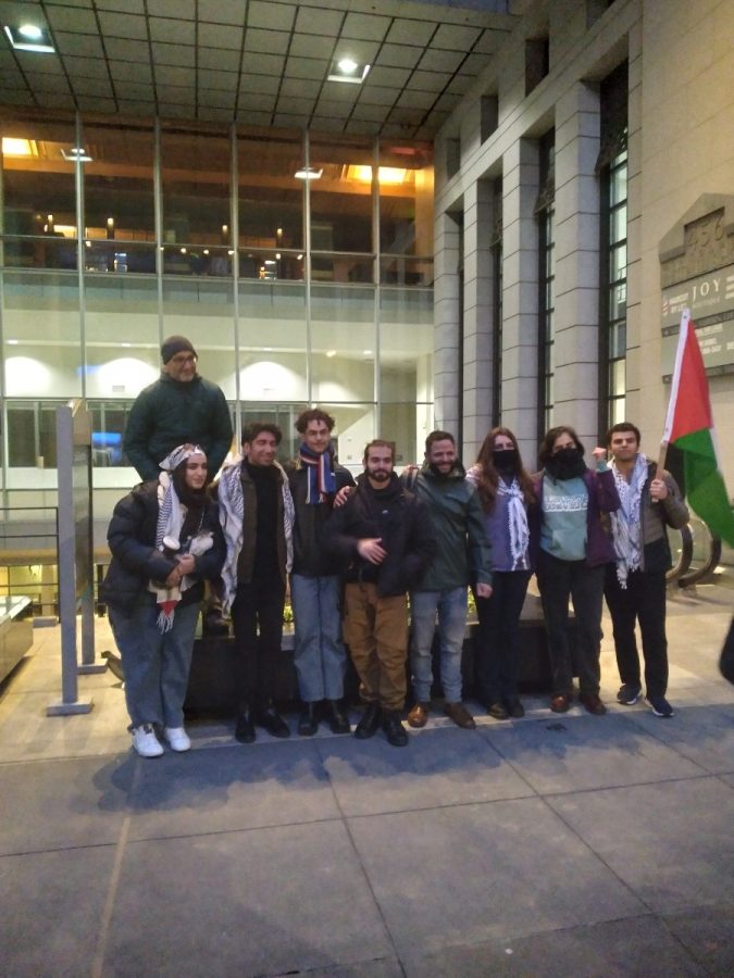 The group of protestors grouped up to take a photo and the lady on the far left is Sabreen Imtair, a Youth Organizer for the Arab and Organizing Center.