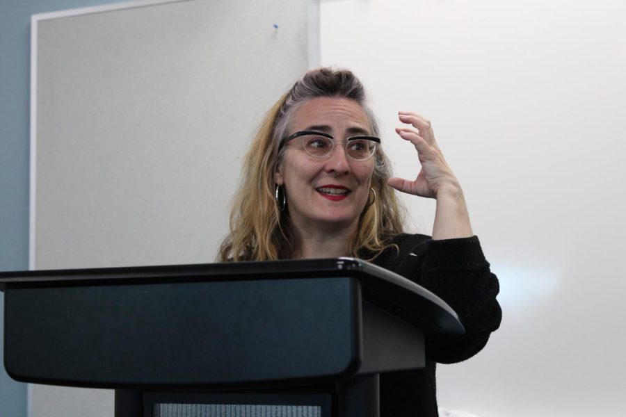Cecil Castellucci, the comic book writer who wrote The Plane James made hand expressions while she talked to the attendee on March 29 at 11 a.m. 