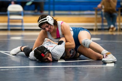 Falcons get yet another takedown on Fresno City as they pile on top to win 42-16 on March 30. 