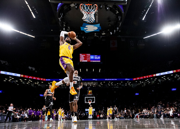 NEW YORK, NEW YORK - JANUARY 25: LeBron James #6 of the Los Angeles Lakers dunks against the Brooklyn Nets at Barclays Center on January 25, 2022 in the Brooklyn borough of New York City. NOTE TO USER: User expressly acknowledges and agrees that, by downloading and or using this photograph, User is consenting to the terms and conditions of the Getty Images License Agreement. 