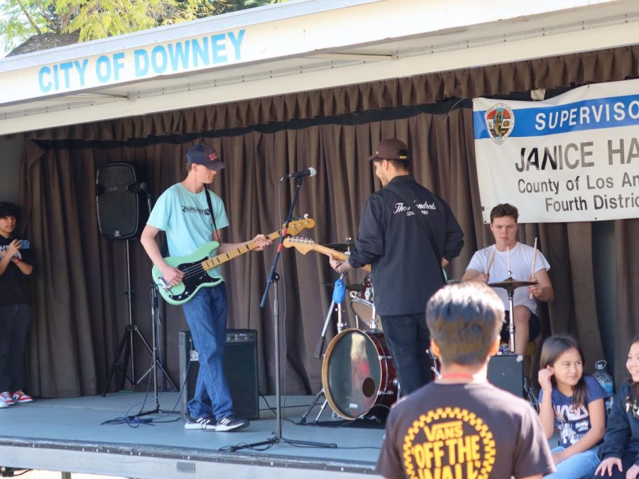 A live band performance on the stage of the City of Downey Street fair, March 18 