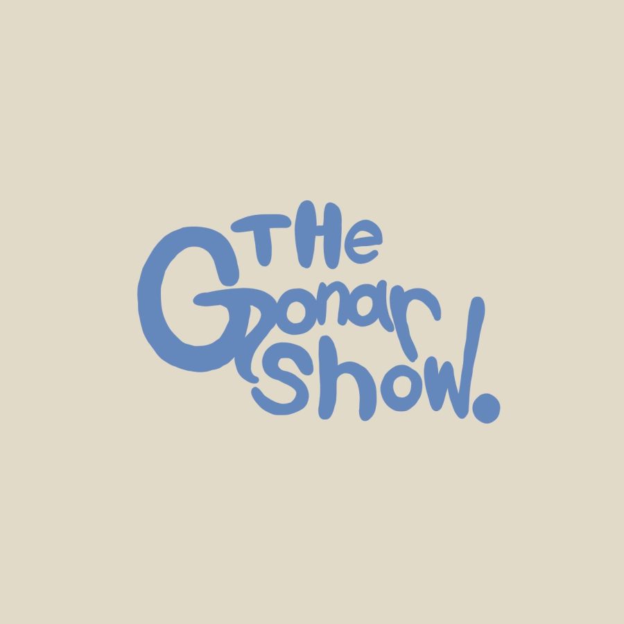 Here's the Gonar Show logo, which is a pale tan background with a baby blue, almost bubble-like font. 