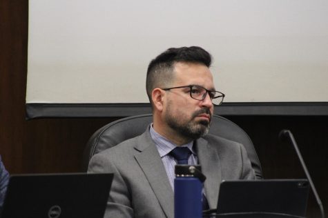 Dr. Fierro, President of Cerritos College, is looking at the speaker during the April 12 board meeting and was one of the people mentioned in the article. 