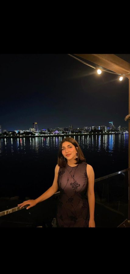 Selma Dweik, the next ASCC Vice President, poses during the night sky.