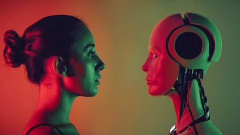 Robot and young woman face to face.