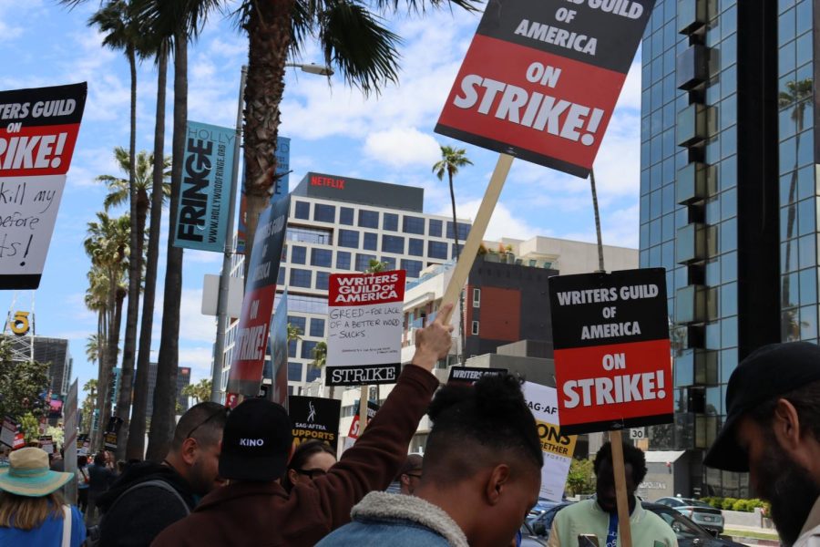 Writers protesting outside of Netflix HQ and Sunset Studios in Los Angeles.