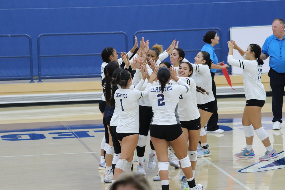 Falcons celebrating together after sweeping the Golden West Rustlers, 3-0 