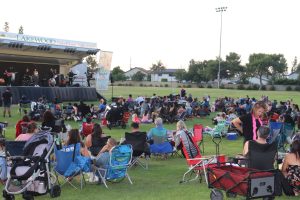 The crowd sits back and enjoys the Selena tribute Band playing Selenas classic, Amor Prohibido.