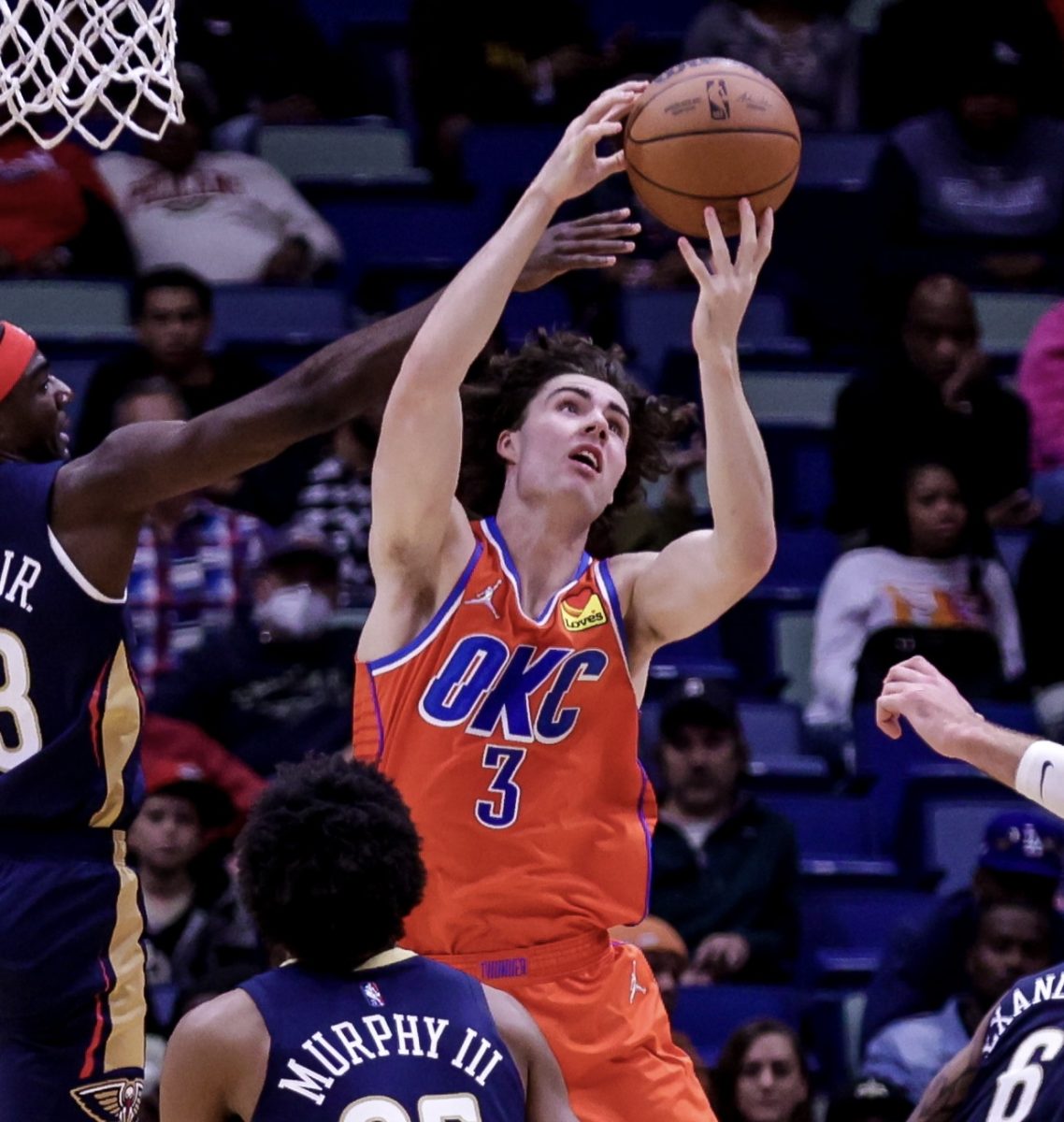 No.3 Josh Giddey of the Oklahoma City Thunder getting ready to lay the ball up in the hoop.