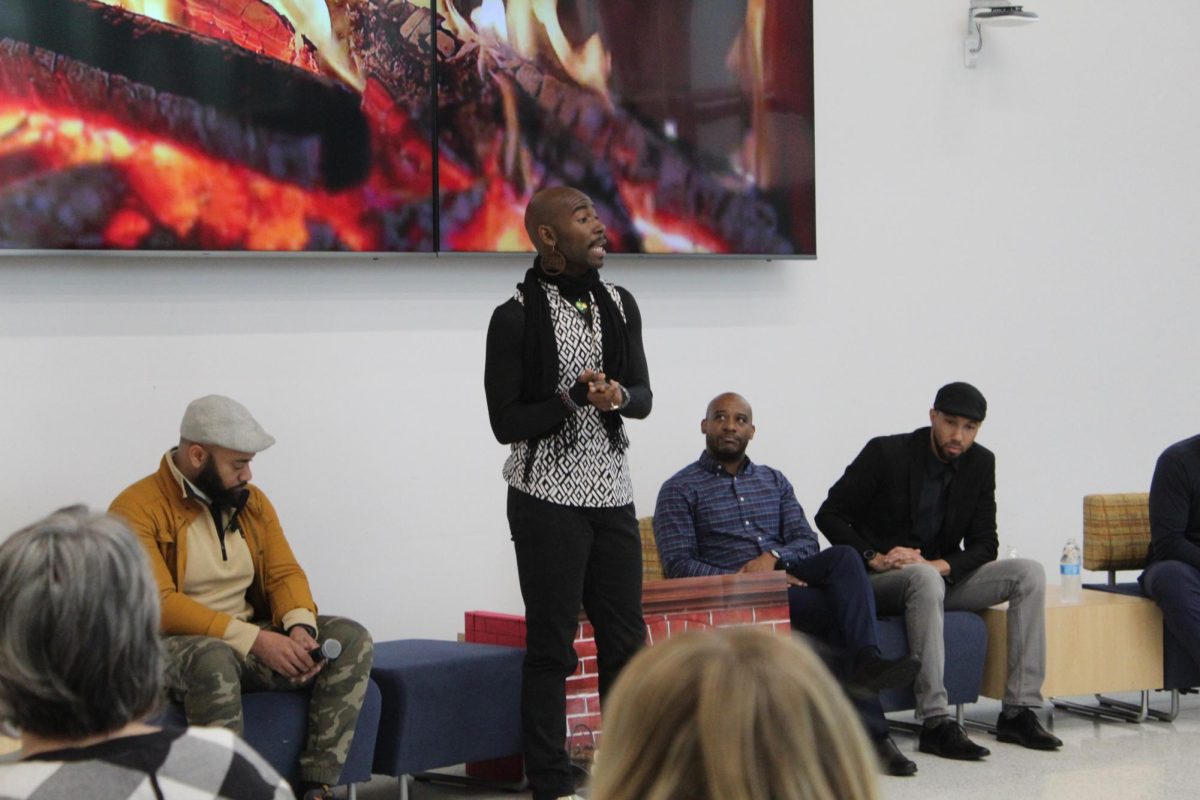 Antonio+Lavermon+giving+a+speech+at+the+panel+of+the+Black+Male+Fireside+Chat.