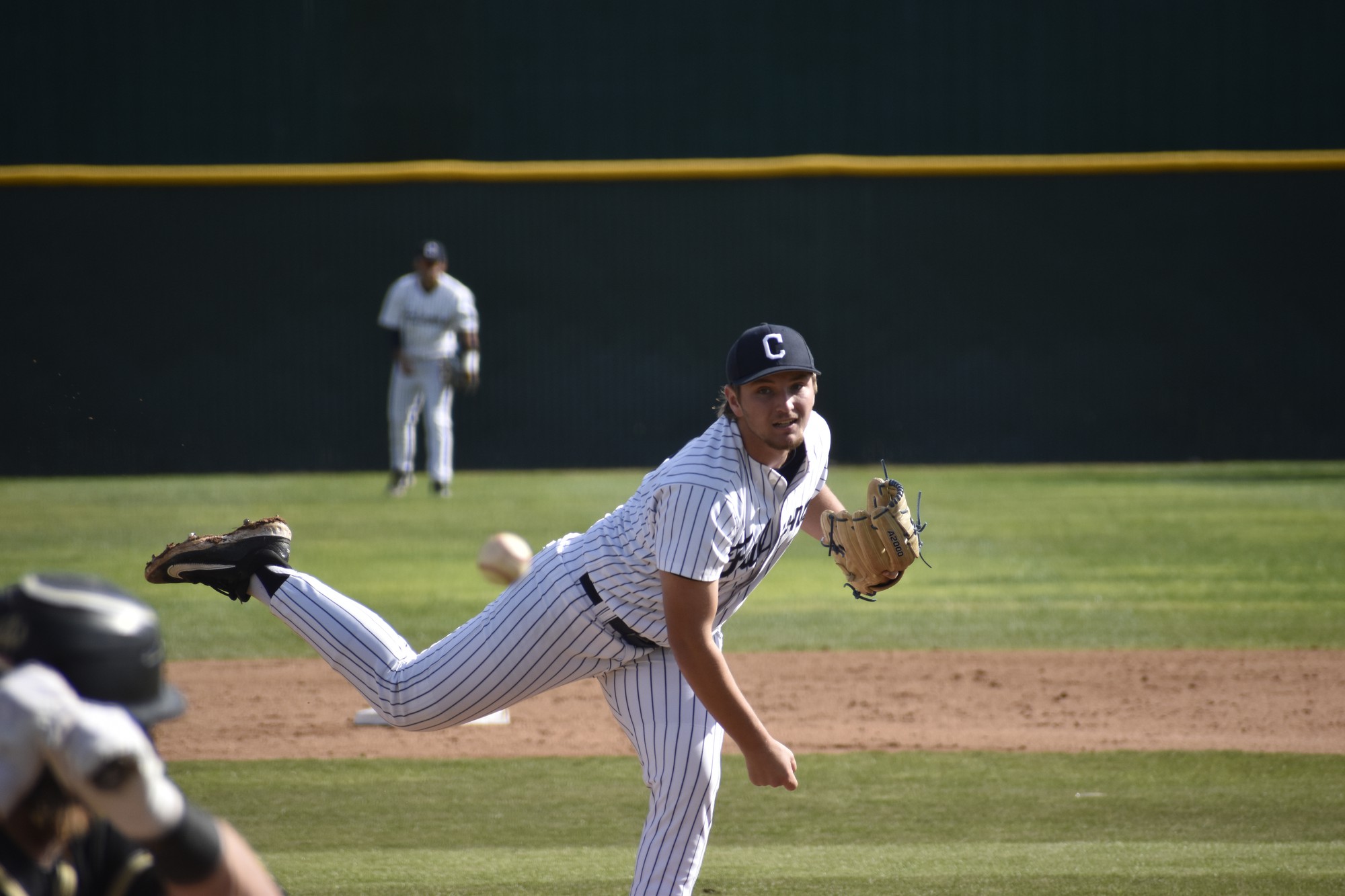 Myles Johnson just after releasing the ball on a pitch. 