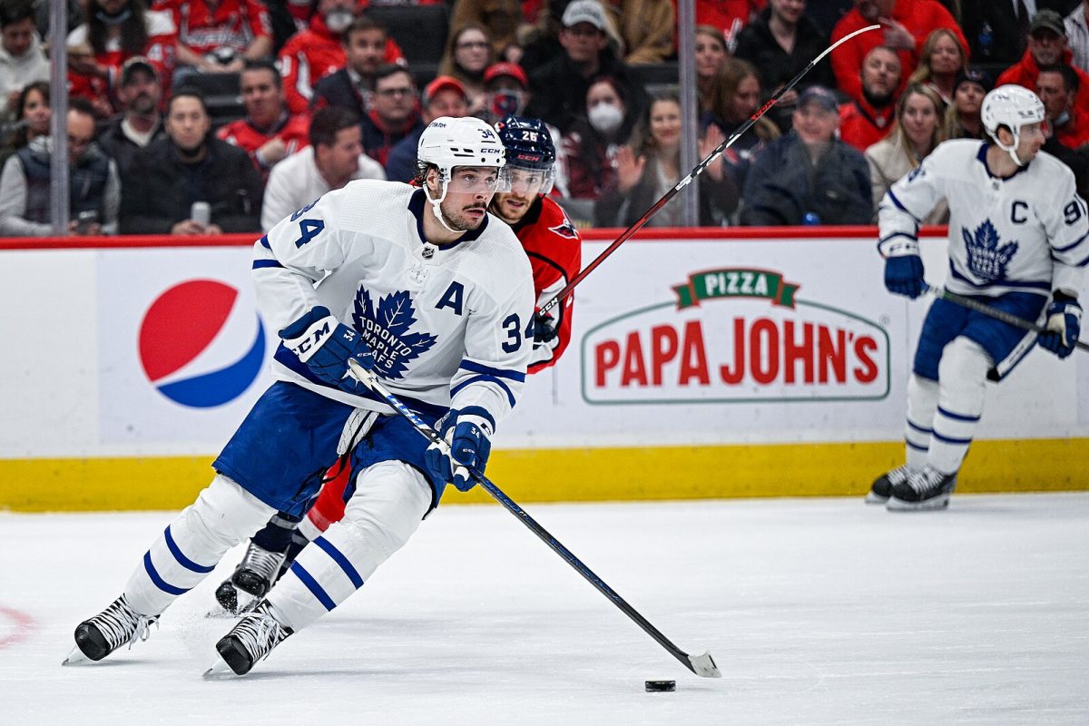 Auston Matthews gaining control of the puck as he skate up ice Photo credit: MapleLeafs-7