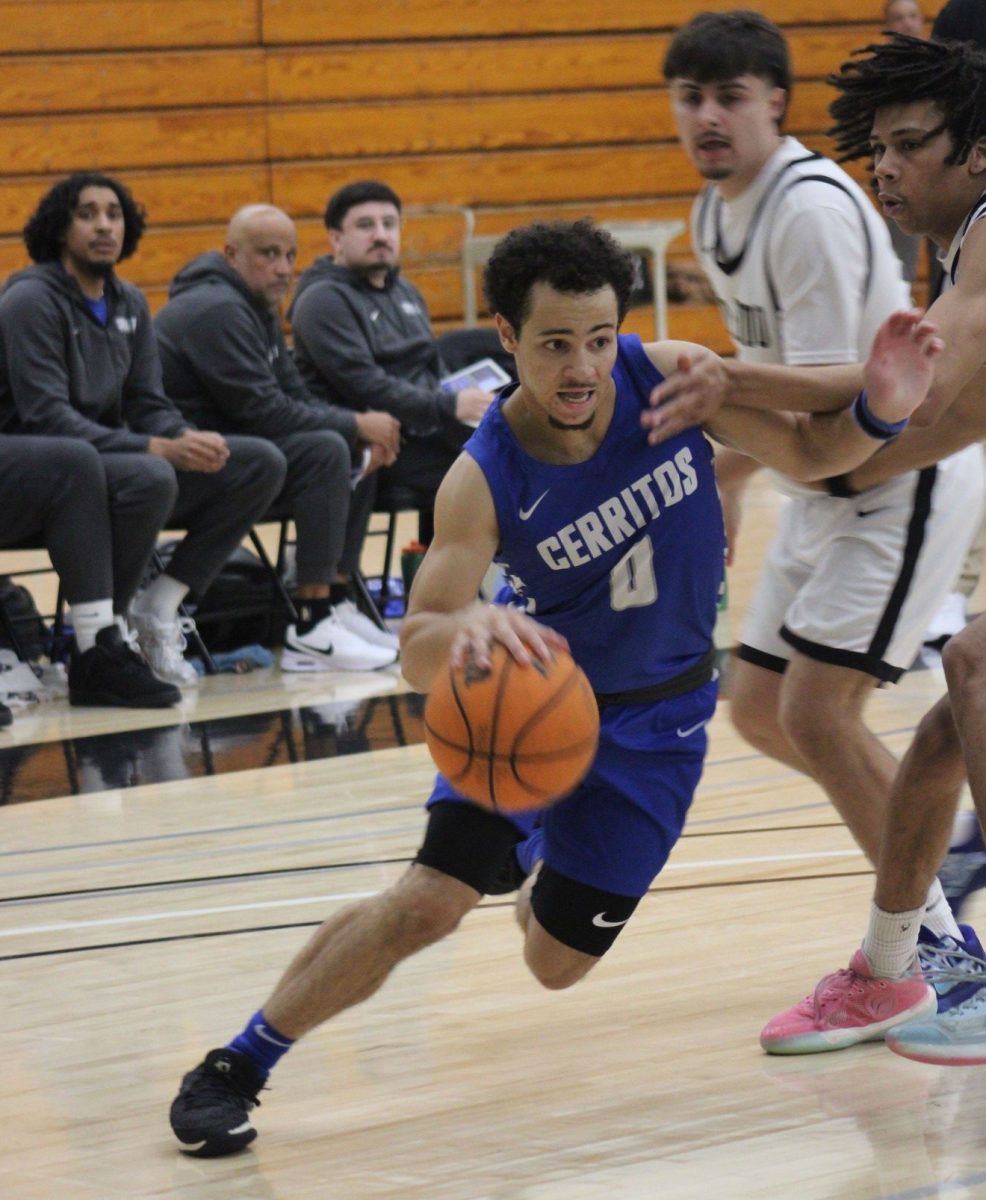 Cerritos guard David Mack dribbles ball past defenders in a game against Rio Hondo College at Rio Hondo College on January 14, 2026. 