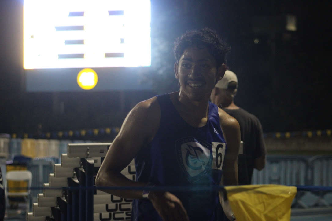 Juan Flores post record-breaking race at Drake Stadium for the Bob Larsen Distance Carnival.