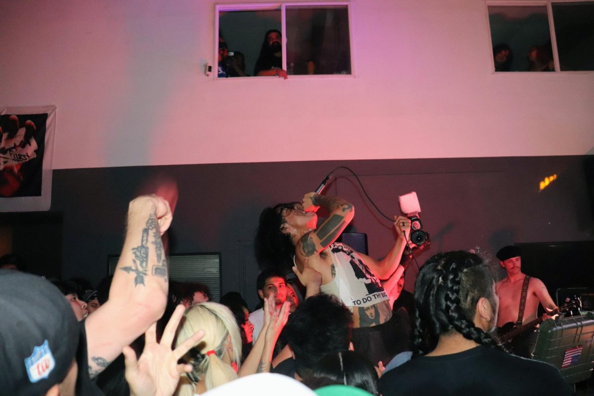 Singer of the hardcore band HKFY preforming at an event called "Sante Fe Springs is Fucked", in Santa Fe Springs, CA, on February 28, 2026.